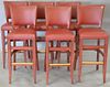 Set of six ISA International bar stools in red leather. ht. 44in.