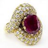 Vintage Large Oval Cut Burma Ruby, Approx. 4.0 Carat Round Brilliant Cut Diamond and 18 Karat Yellow Gold Ring.