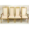 Set of Eight (8) Italian Neoclassical Style Gilt Carved and Upholstered Chairs. Includes two arm chairs and six side chairs.