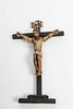 * A Spanish Colonial Carved and Painted Crucifix Height 12 1/2 inches.