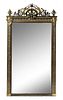 * A Victorian Neoclassical Partial Ebonized and Gilt Pier Mirror