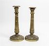 * A Pair of Empire Style Gilt Metal Candlesticks Height 10 1/2 inches.