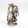 * An English Bocage Figural Group Height 10 3/4 inches.