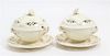 * A Pair of Reticulated Creamware Tureens on Stands Width at widest 6 1/2 inches.