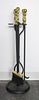 An Assembled Set of Metal Fireplace Tools Height of stand 31 inches.