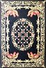 * A Hooked Wool Rug 5 feet 7 inches x 3 feet 9 inches.