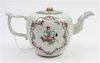 * A Chinese Export Porcelain Teapot Height overall 4 inches.