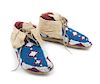 A Pair of Northern Plains Beaded Moccasins Length 9 1/4 inches