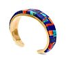 A Hopi 14 Karat Yellow Gold, Lapis Lazuli, Coral and Turquoise Cuff Bracelet, Charles Loloma (1921-1991) Length of bracelet 5