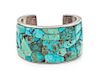 A Hopi Silver and Turquoise Cuff Bracelet, Charles Loloma (1921-1991) Length 5 1/4 x opening 1 x width 1 1/2 inches.