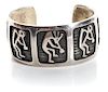 A Hopi Silver Bracelet, Bernard Dawahoya (1937-2010) Length 5 x opening 3/8 x width 1 1/8 inches.
