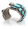A Navajo Silver and Turquoise Watch Cuff Bracelet, Orville Tsinnie (1943-2017) Length 5 7/8 x opening 1 5/8 x width 2 5/8 inc