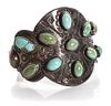 A Navajo Silver and Turquoise Cuff Bracelet Length 5 1/2 x opening 1 1/4 x width 2 1/4 inches.