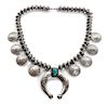 A Coin Silver and Turquoise Squash Blossom Necklace Length 24 inches; naja 2 1/2 x 3 inches.