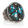 A Kewa Silver and Turquoise Bracelet, Julian Lovato (b. 1922) Length 5 1/8 x opening 1 1/4 x width 2 3/8 inches.