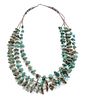 A Three-Strand Heishi and Graduated Turquoise Nugget Necklace Length 32 inches.