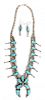 A Southwestern Silver and Turquoise Channel Inlay Squash Blossom Necklace and Earring Set Length of necklace 20 inches.