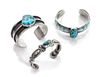 Three Silver and Turquoise Cuffs Length of the first 5 3/8 x opening 1 x width 5/8 inches.