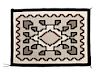 Two Navajo Two Grey Hills Rugs Larger: 43 1/2 x 26 1/2 inches.