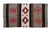 A Finely Woven Navajo Mat 21 1/2 x 35 1/4 inches.