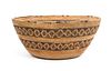 A Tulare Basket Bowl Height 4 1/2 x diameter 10 1/4 inches.
