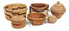 A Collection of American Indian Baskets Height of largest 4 x diameter 8 inches.