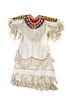 A Plateau Style Beaded and Hide Woman's Dress Maximum width of larger 40 1/2 x length 46 1/2 inches.