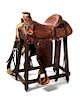 A Tooled Brown Leather Western Saddle Seat 15 3/4 inches.