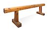 A Wooden Six Saddle Stand Height 35 1/2 x width 142 x depth 26 1/2 inches.