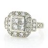 Platinum and square-cut diamond ring.