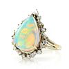 14k White gold, opal and diamond ring.