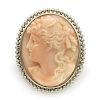 Platinum and coral cameo brooch/pendant.