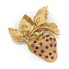 14k Yellow gold and ruby strawberry brooch.