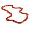 Antique coral necklace with 14k yellow gold clasp.