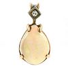 14k Yellow gold, opal and diamond pendant.