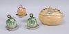 THREE VLADIMIR KANEVSKY GLAZED POTTERY MELON-FORM SAUCE TUREENS, COVERS AND STANDS AND A LARGE MELON-FORM TUREEN AND COVER