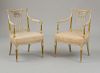 PAIR OF GEORGE III CREAM-PAINTED AND PARCEL-GILT ARMCHAIRS, STAMPED C.S.