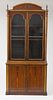 REGENCY STYLE ROSEWOOD AND PARCEL-GILT BOOKCASE