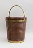 REGENCY BRASS-BANDED MAHOGANY RING-TURNED BUCKET AND A VICTORIAN BRASS-BANDED OAK AND WALNUT BUCKET