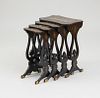 CHINESE EXPORT BLACK LACQUER AND PARCEL-GILT NEST OF FOUR TABLES