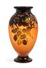 * Emile Galle, (French, 1846-1904), a mold blown cameo glass vase, with wild rose decoration