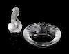 Lalique, a group of two molded and frosted glass articles, comprising a Tete de Lion ash receiver and a Leda and the Swan fig
