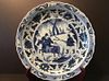 A Fine Chinese Blue and White Charger with Horse, soldiers and Knives. 17 1/2" dia.