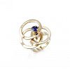A Sapphire and Diamond Kinetic Spinning Ring