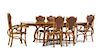 * A Spanish Art Nouveau Oak Dining Room Suite, Height of first overall 83 inches.