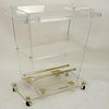 Large Mid Century Lucite And Brass Rolling Bar Cart. Three tiers.