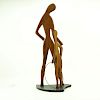 Val Robbins, American (1925-2009) Circa 1950's Carved walnut sculpture "Mother and Son With Hula Hoop".