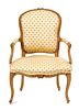 A Louis XV Fruitwood Fauteuil Height 37 3/4 inches.