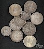 Seven Morgan silver dollars