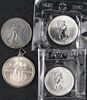 Four 1 ozt. fine silver medals.